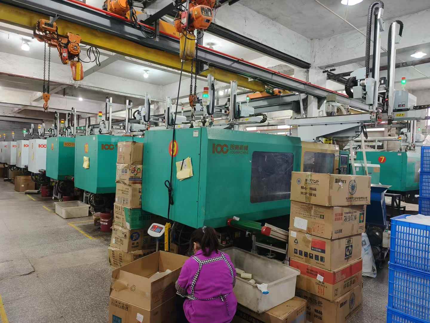 Injection-molding equipment inside the factory.